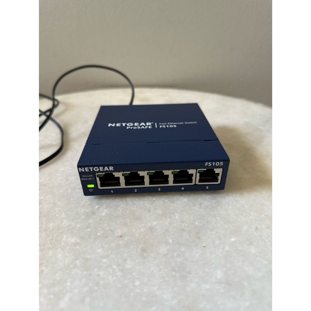 NETGEAR FS105 ProSafe Fast Ethernet Switch 5 Port 10/100 Mbps with Power Adapter